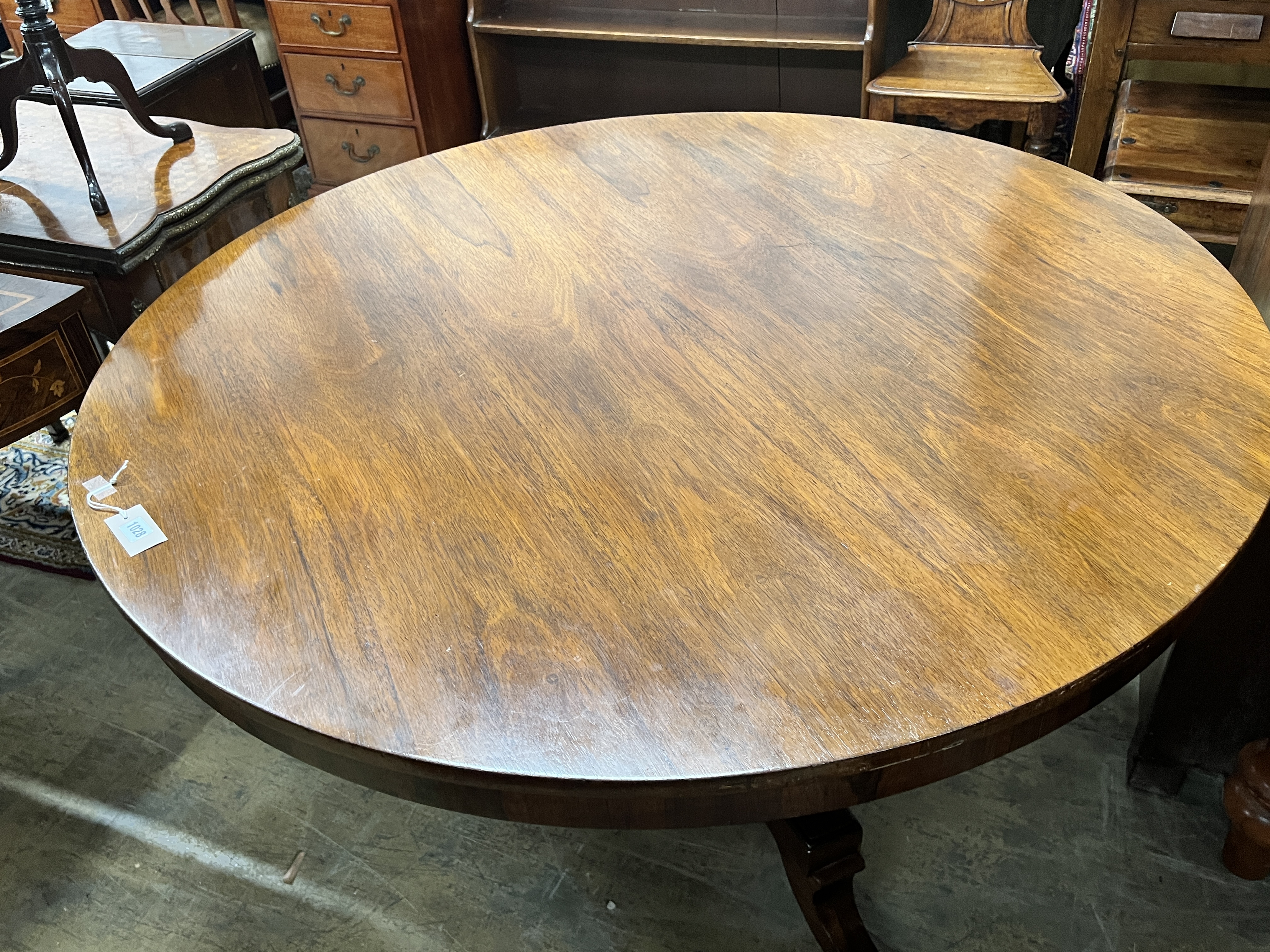 A Regency circular faded rosewood breakfast table, diameter 131cm, height 70cm